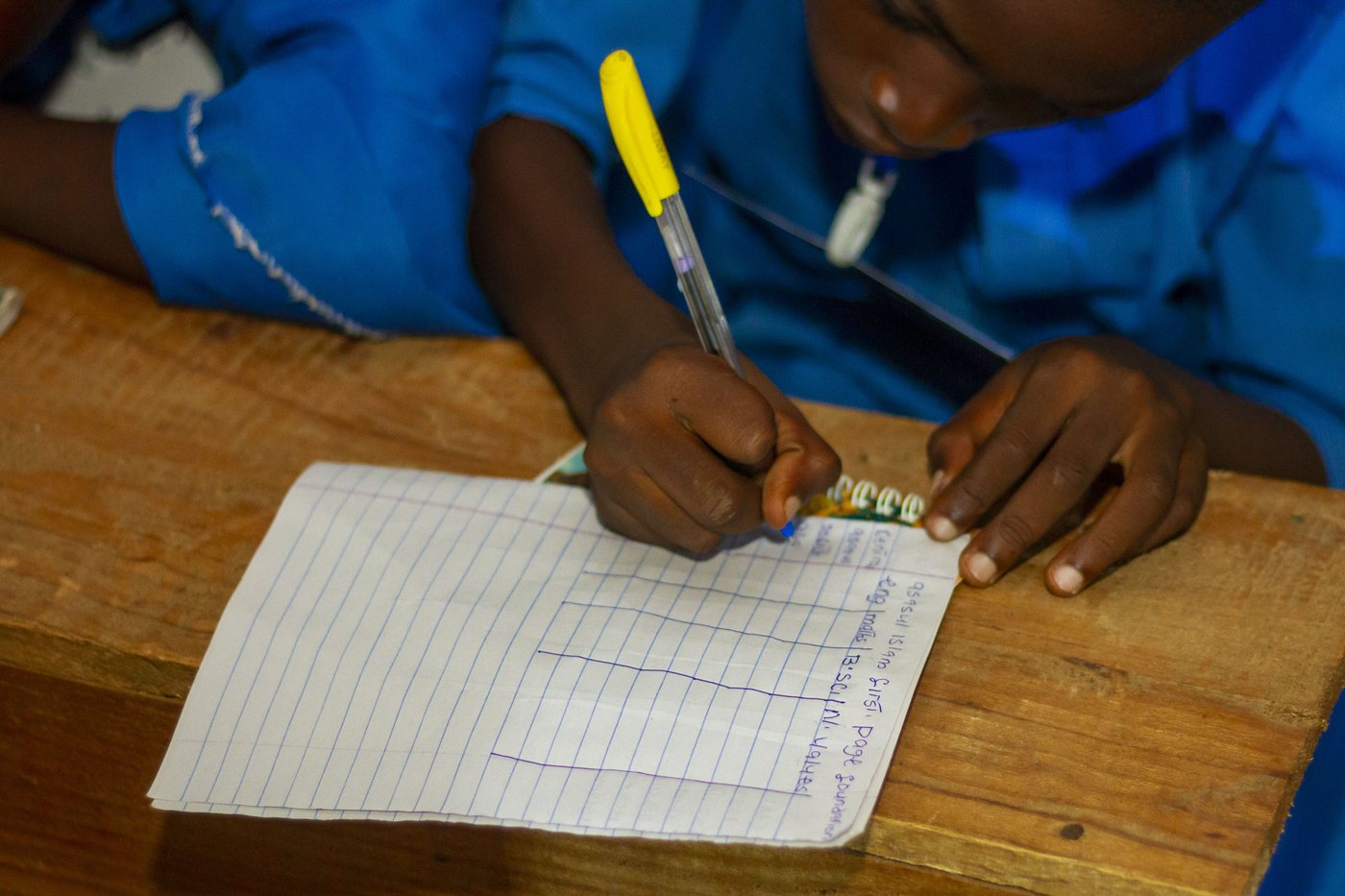 A FirstPage Foundation student engaged in her studies